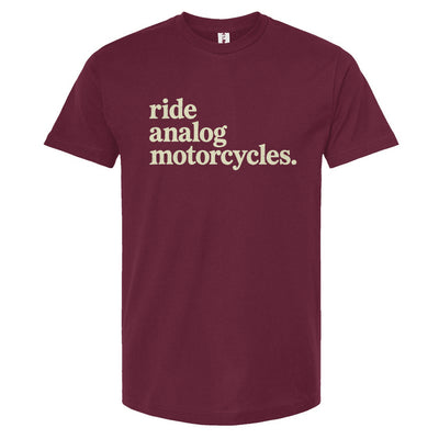 Burgundy t-shirt with white text 'ride analog motorcycles' on a white background