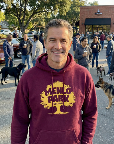 Man wearing a 'Menlo Park' hooded sweatshirt at a local cars and coffee event with cars and dogs