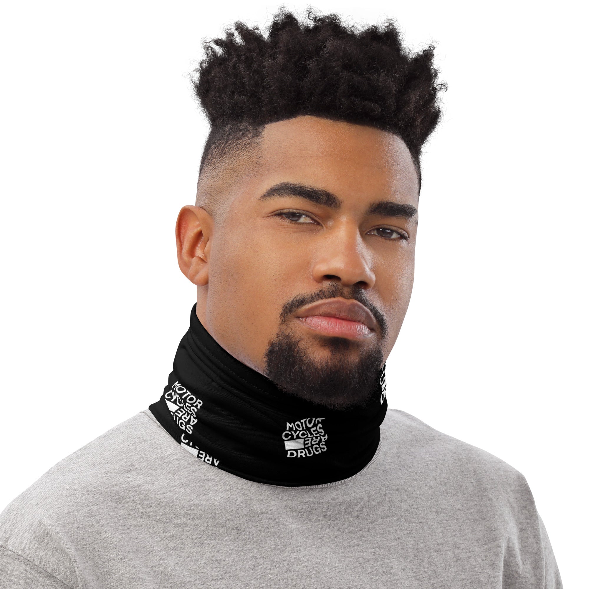 Man wearing "Motorcycles are drugs" logo neck gaiter