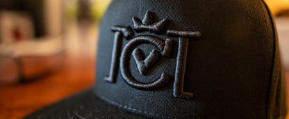 Crown Moto trademarked logo embroidered in 3d puff on black hat