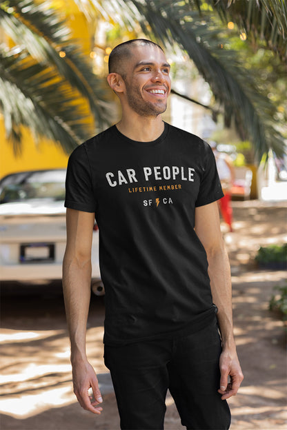 Male model wearing a navy blue t-shirt with original "CAR PEOPLE" SF design printed across chest