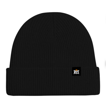 Black colored cashmere beanie with a small Crown Moto woven logo patch sewn to top cuff
