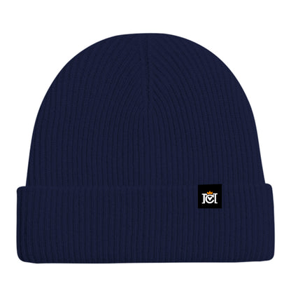 Navy blue colored cashmere beanie with a small Crown Moto woven logo patch sewn to top cuff