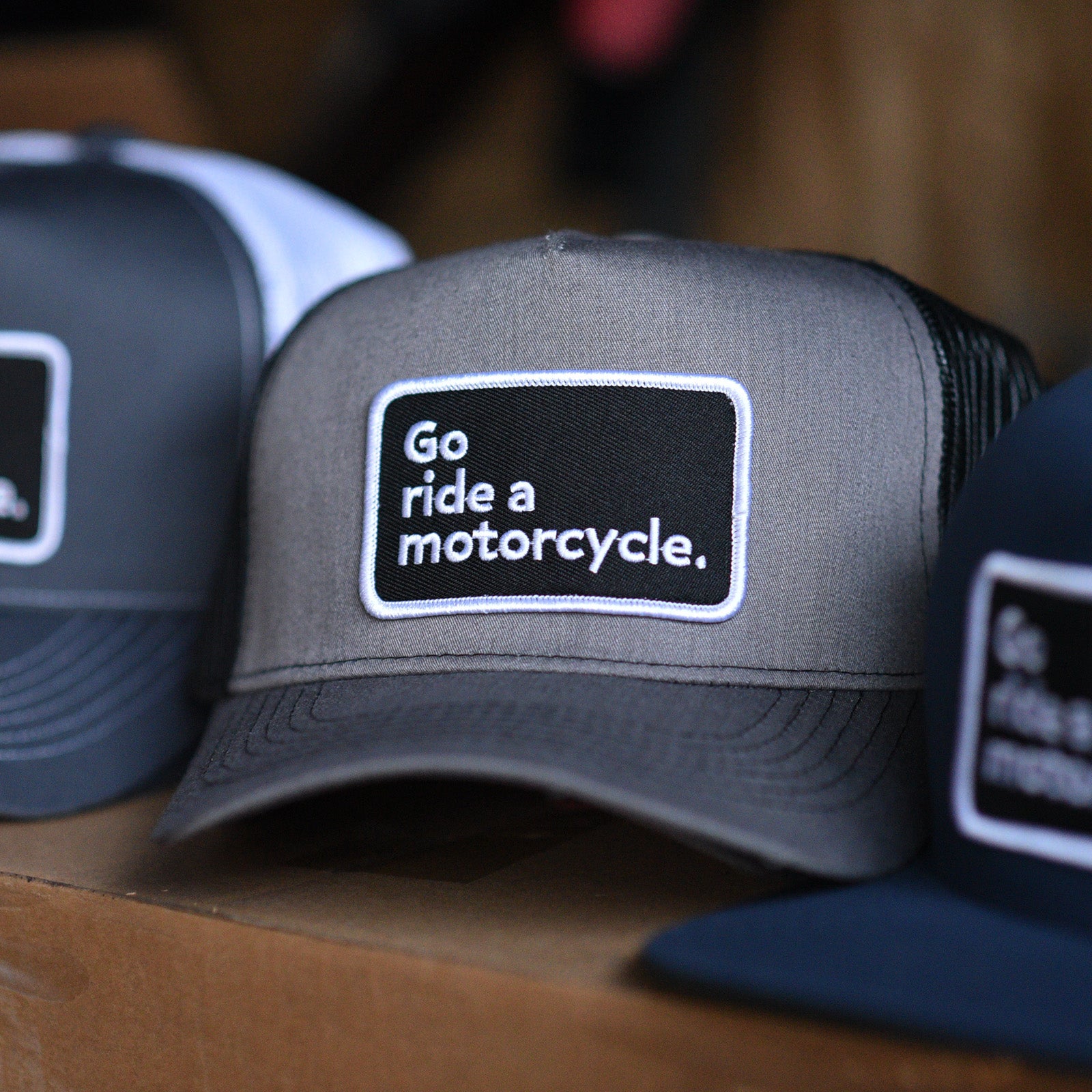 Go ride a motorcycle charcoal gray and black snapback trucker hat, motorcycle hats, motorcycle lifestyle, trucker hat, gifts for him, gifts for riders, gifts for motorcyclists, embroidered patch