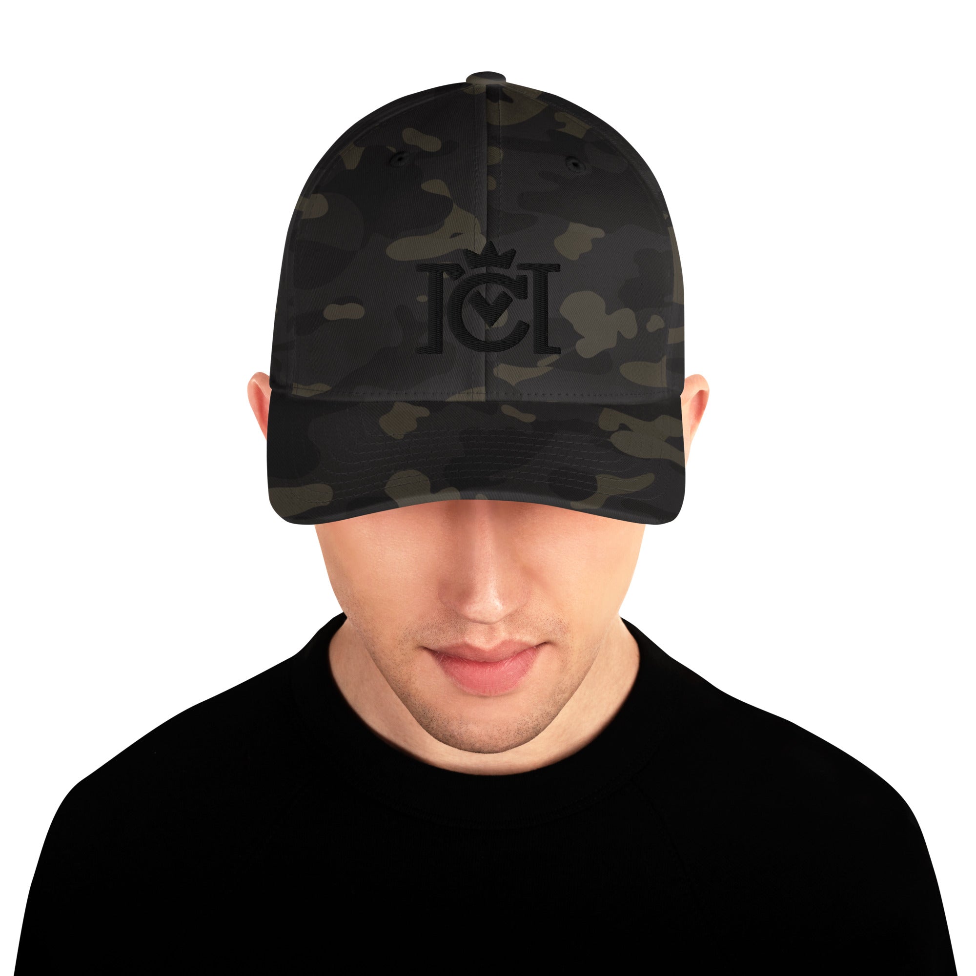 Man wearing trademarked crown moto logo embroidered in 3D puff style on front of flexfit hat 