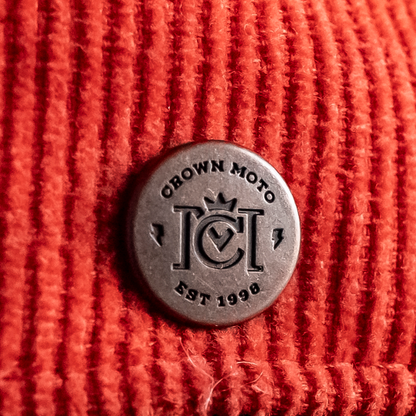 crown moto trademarked logo bronze rivet applied to the back of premium hats