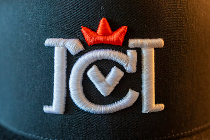 Trademarked Crown Moto logo embroidered in 3d puff style on front of snapback trucker hat