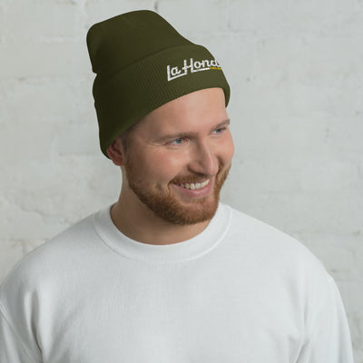Man wearing olive color La Honda California embroidered beanie