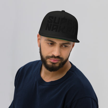 Man wearing a Super Naked 3d puff embroidered black snapback hat by Crown Moto