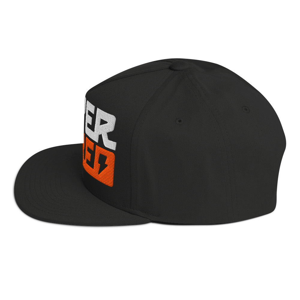 Profile view of orange and white Super Naked logo embroidered on front of black snapback hat by Crown Moto