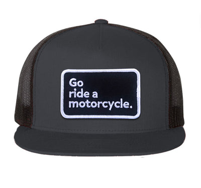 Flat brim Charcoal Grey and Black Mesh trucker cap with 'Go ride a motorcycle.' embroidered patch on front