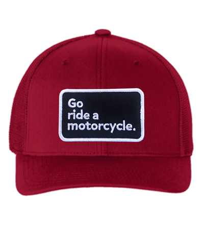 "Go ride a motorcycle" patch sewn on front of flexfit trucker hat