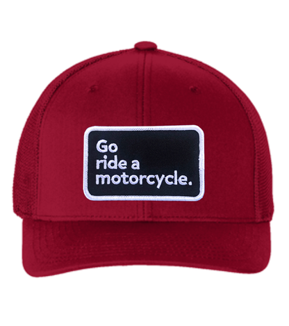 "Go ride a motorcycle" patch sewn on front of flexfit hat