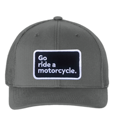 "Go ride a motorcycle" patch sewn on front of flexfit trucker hat