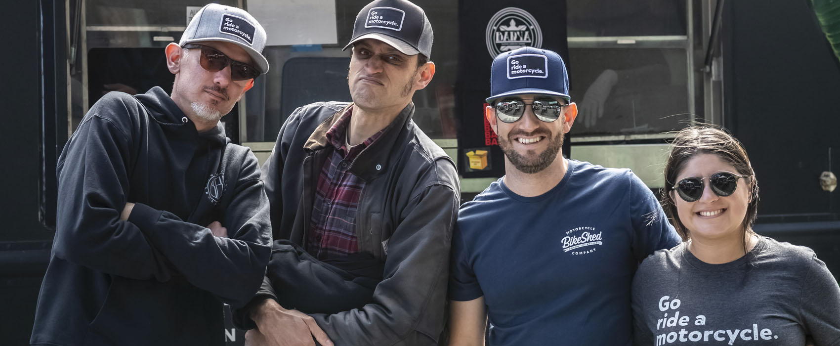 group of friends wearing "go ride a motorcycle" hats and t-shirt, friend of the program