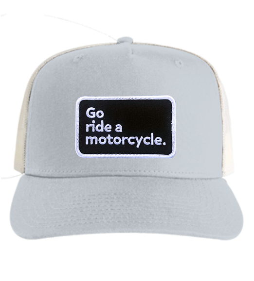 "Go ride a motorcycle" patch sewn on front of trucker hat