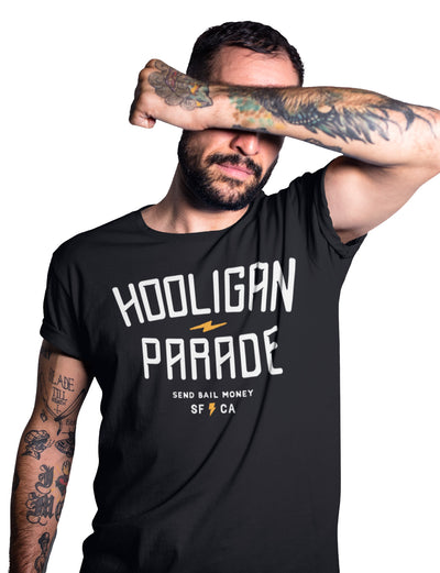 Man wearing Hooligan Parade OG black t-shirt, hooligans, motorcycle shirts, motorcycle lifestyle, supermoto, san francisco, sf, california