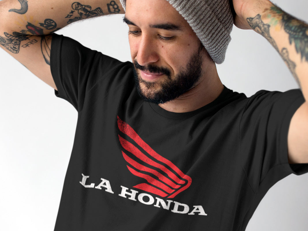 Man wearing La Honda parody honda motorcycle design on chest of short sleeve t-shirt