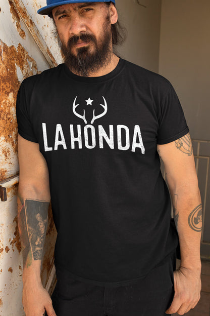 Man wearing black short sleeve t-shirt with La Honda Venison design on chest