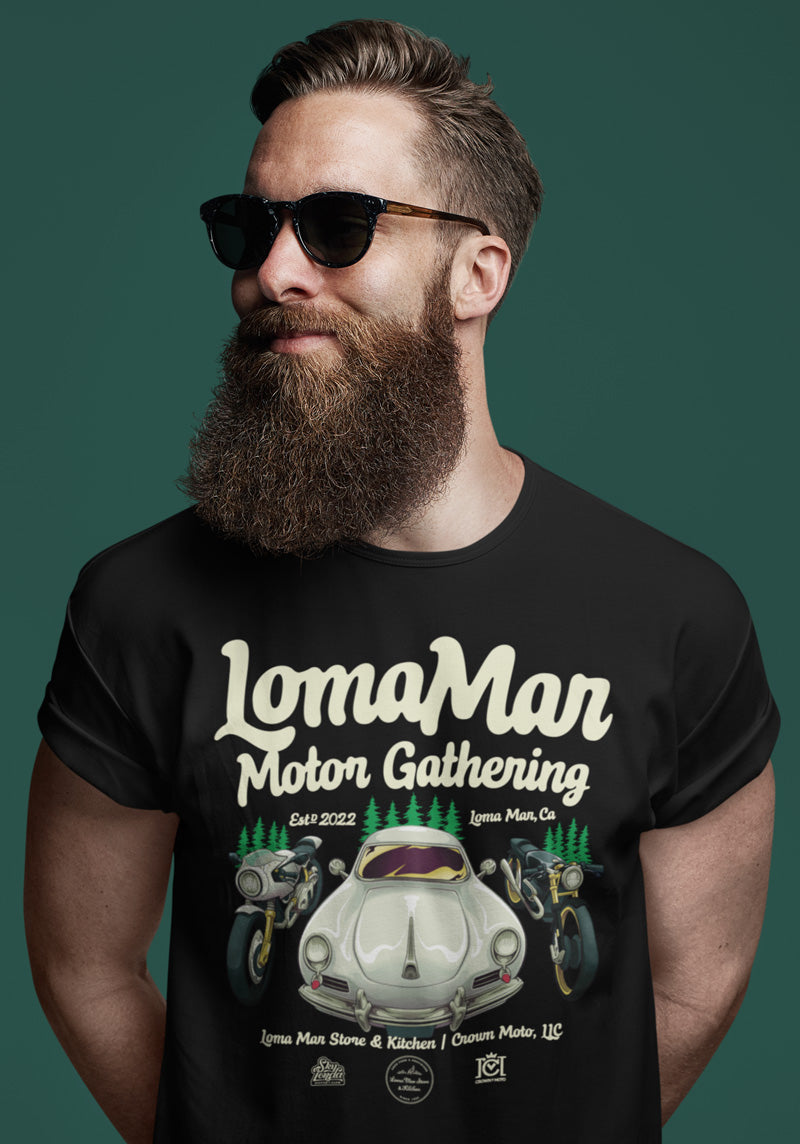 Man wearing black short sleeve t-shirt with "Loma Mar Motor Gathering" poster art on chest