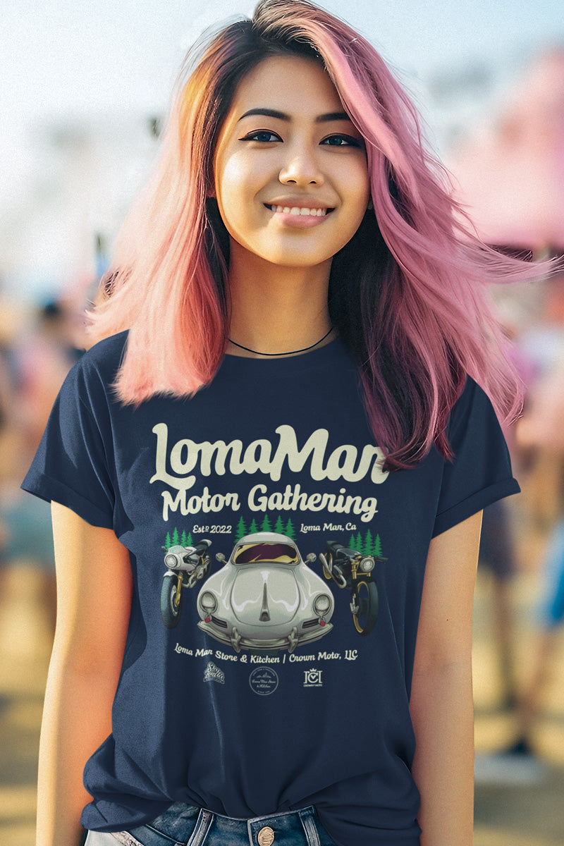 Woman wearing navy short sleeve t-shirt with "Loma Mar Motor Gathering" poster art on chest