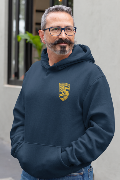 Man wearing a navy blue hoodie with Woodside Porsche design printed in signal yellow on left chest 