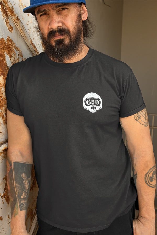 Man wearing t-shirt with motorcycle helmet 650 on left chest