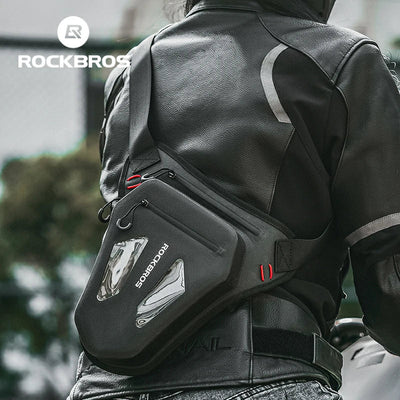 Person wearing a black RockBros bag on their back with a blurred background