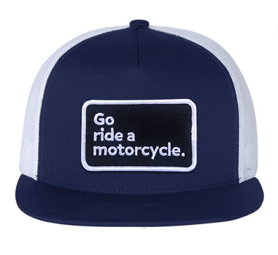 Navy blue and white cap with 'Go ride a motorcycle.' text on a white background
