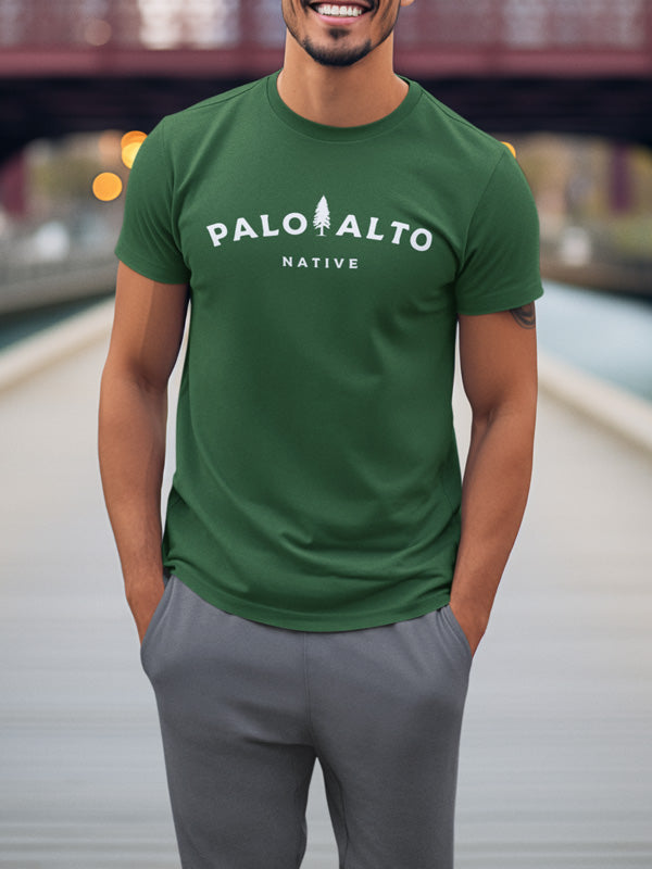 Fit, black male model wearing a Palo Alto Native green t-shirt by Crown Moto