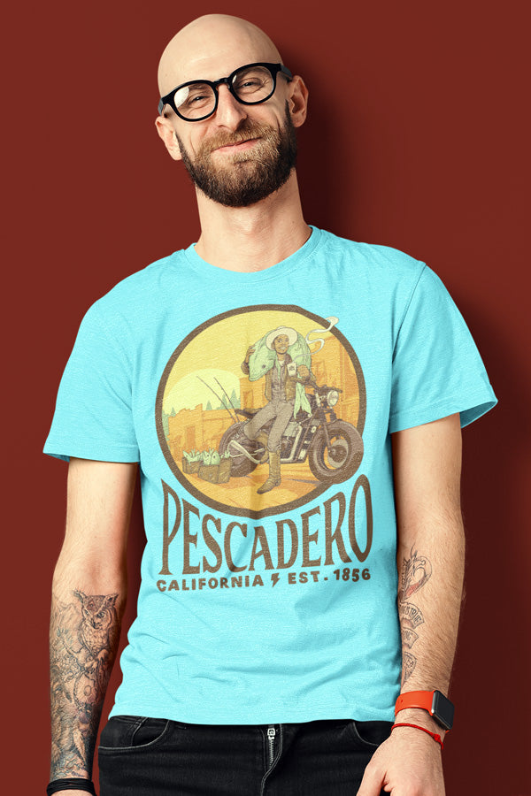 Man wearing short sleeve t-shirt with original NEMO designed Pescadero artwork from Crown Moto