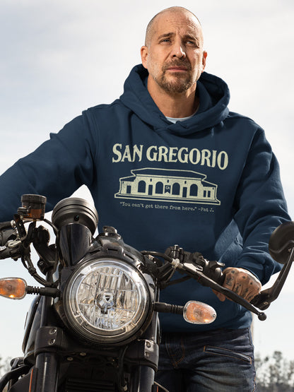 Man pushing motorcycle wearing a San Gregorio navy blue hooded sweatshirt from crown moto