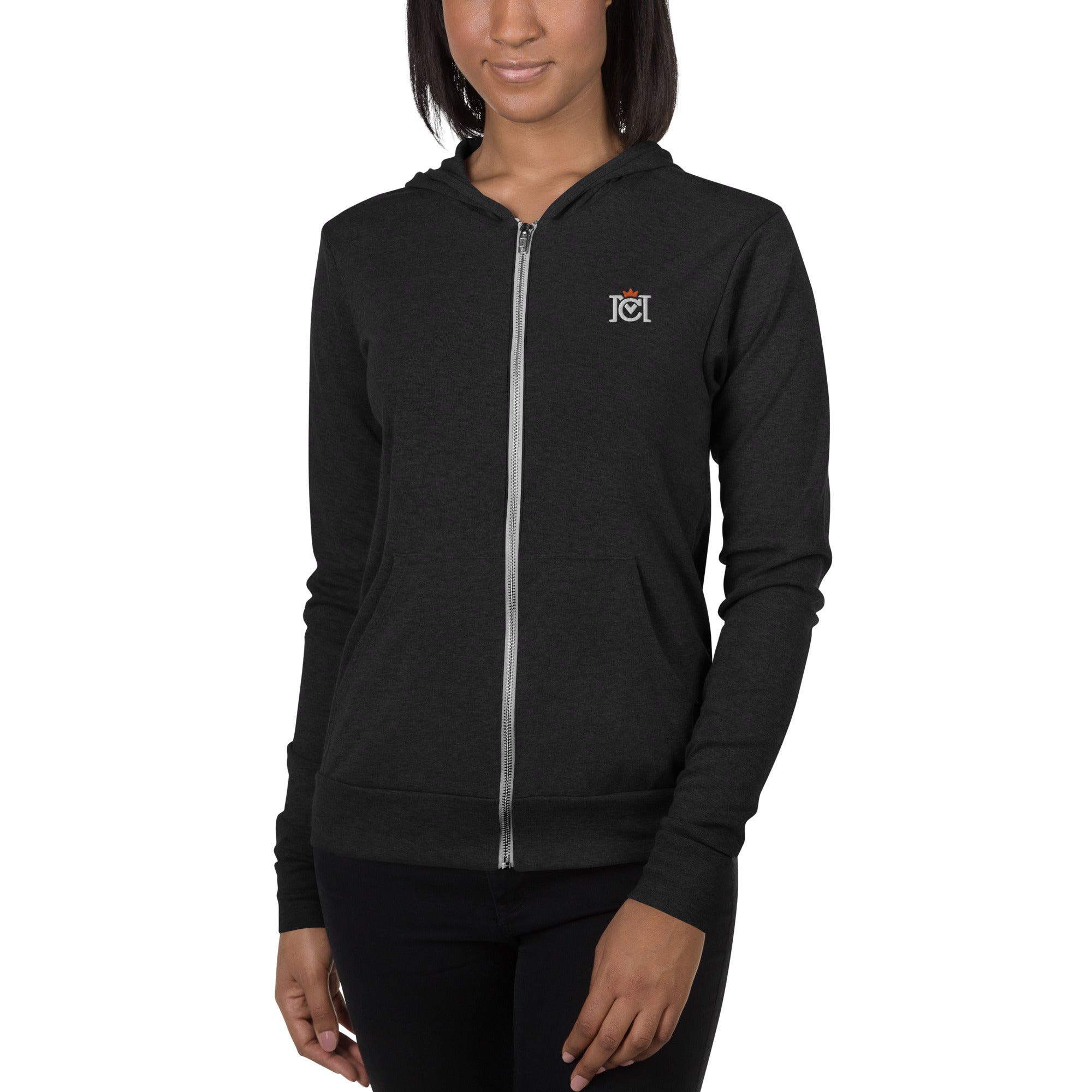 Woman wearing lightweight full zip hoodie with trademarked crown moto logo embroidered on left chest