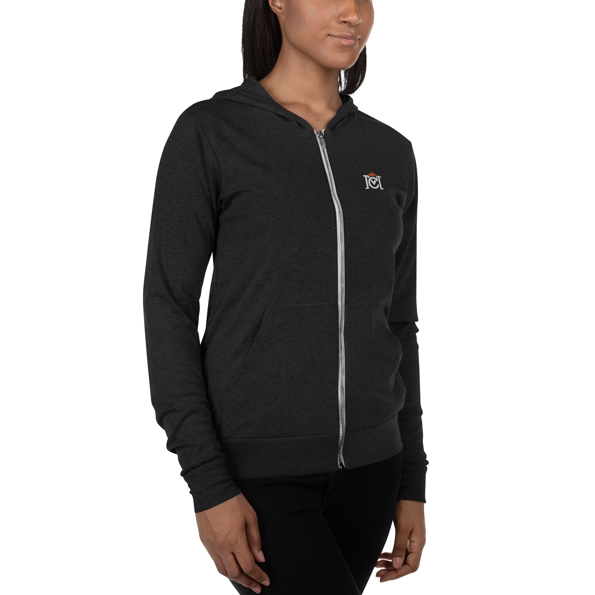 Woman wearing lightweight full zip hoodie with trademarked crown moto logo embroidered on left chest