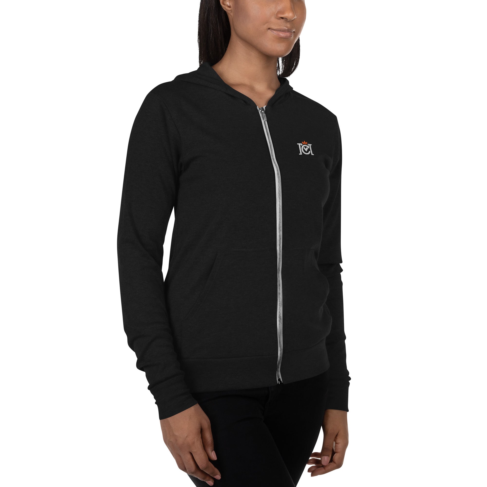 Woman wearing lightweight full zip hoodie with trademarked crown moto logo embroidered on left chest