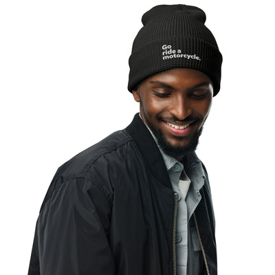 Man wearing a "Go ride a motorcycle" waffle knit embroidered beanie