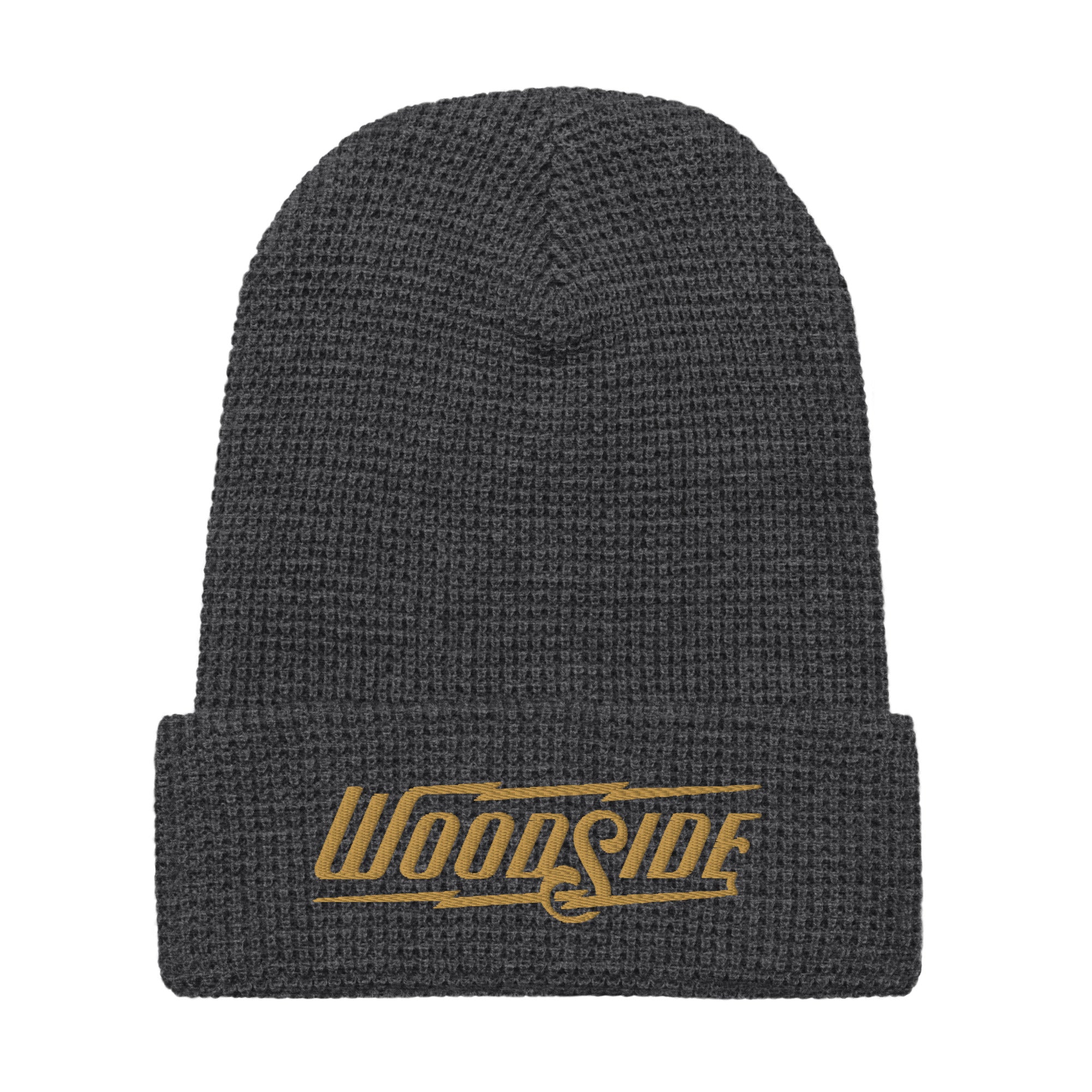 Product mockup of Woodside brand waffle knit beanie with Woodside Brand logo embroidered in gold on front cuff