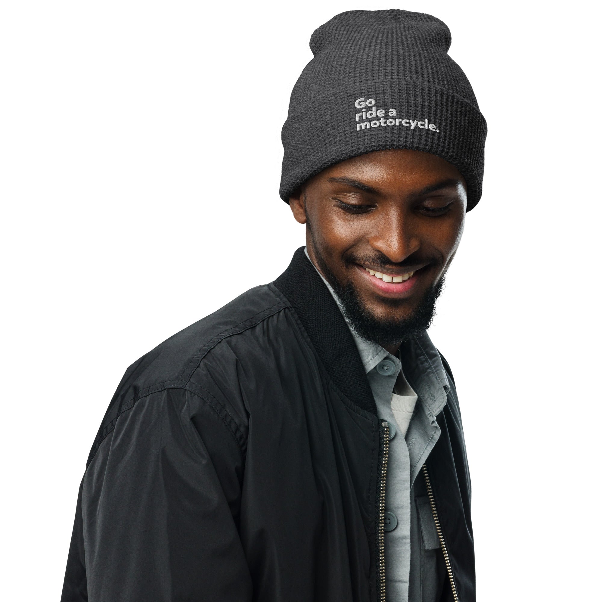 Man wearing a "Go ride a motorcycle" waffle knit embroidered beanie