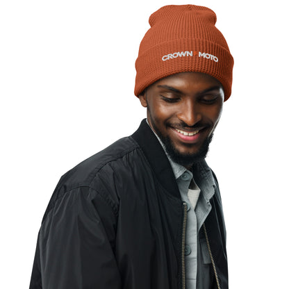 man wearing waffle knit beanie with "crown moto" text and lightning bolt embroidered on cuff