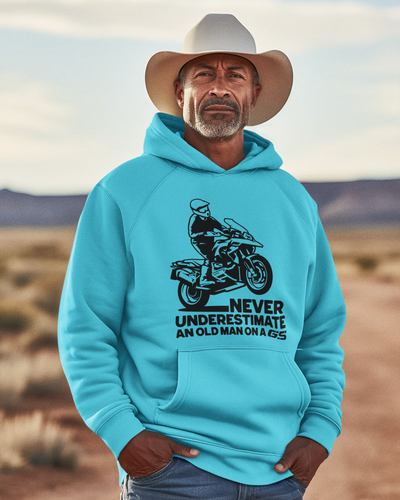 Image of a man in a cowboy hat wearing a light blue GS hoodie