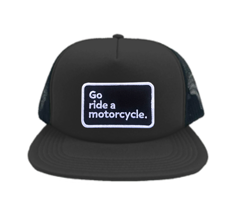 "Go ride a motorcycle" patch sewn to the front of old school foam front trucker hat