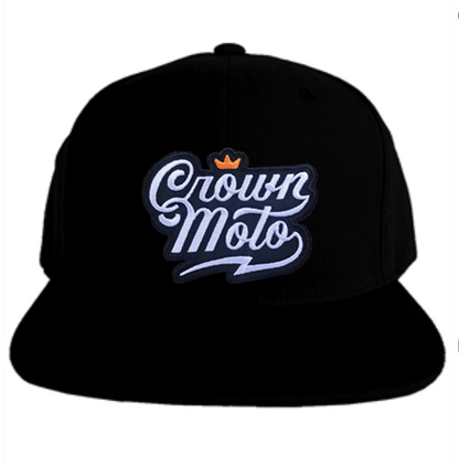 crown moto script logo patch sewn to the front of black flat brim snapback hat