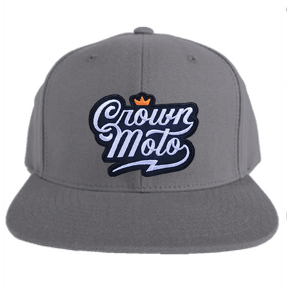 crown moto script logo patch sewn to the front of grey flat brim snapback hat