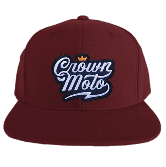 crown moto script logo patch sewn to the front of maroon flat brim snapback hat