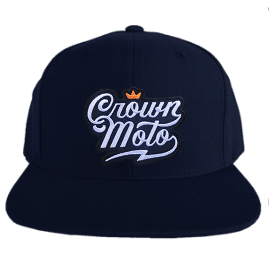 crown moto script logo patch sewn to the front of navy flat brim snapback hat