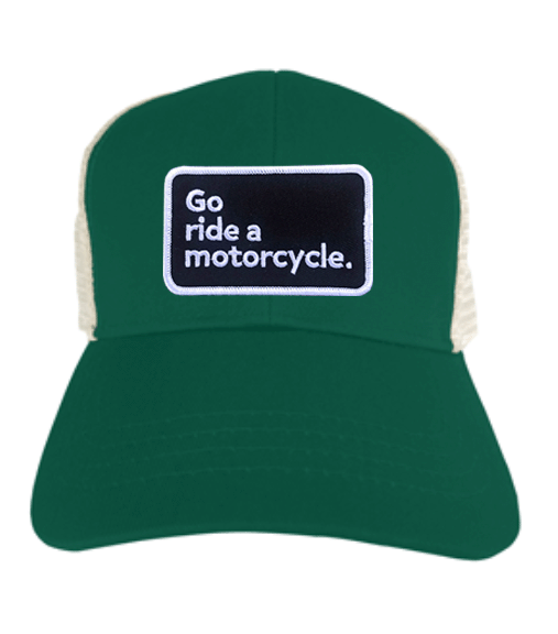 "Go ride a motorcycle" patch sewn to the front of eco trucker hat