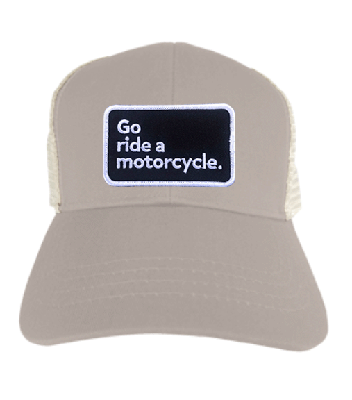 "Go ride a motorcycle" patch sewn to the front of eco trucker hat